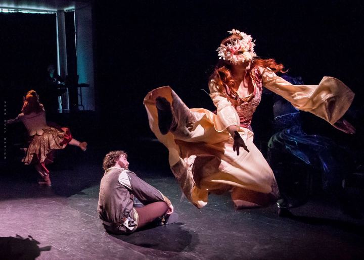 Lexi mid-leap as a fairy in a stage production of Robin Hood